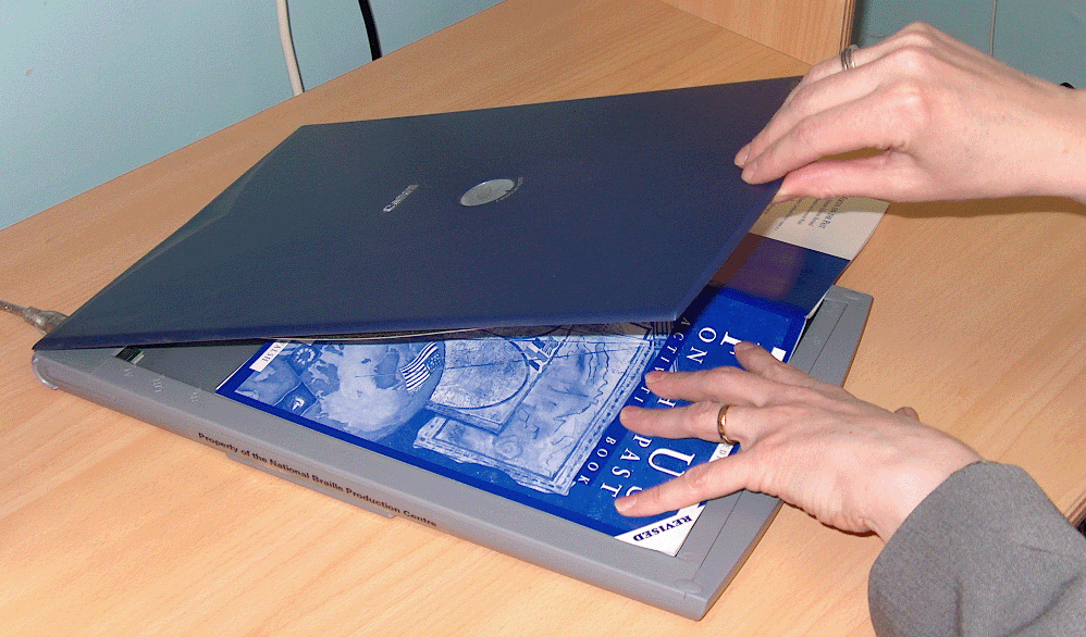 Scanning a book on flatbed scanner. Click on image to enlarge